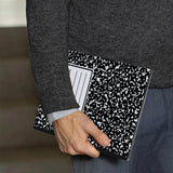 A business man holds Personalized VistaCase reMarkable Pen Holder Case with Composite Book design